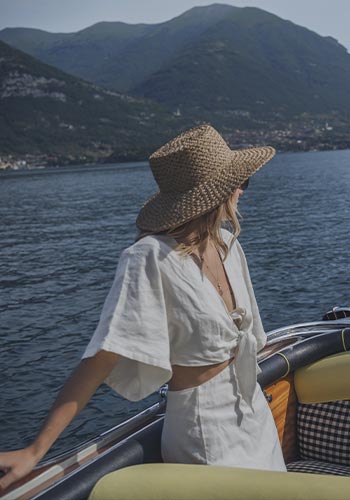 Woman aboard a luxury wooden boat in Lake Como